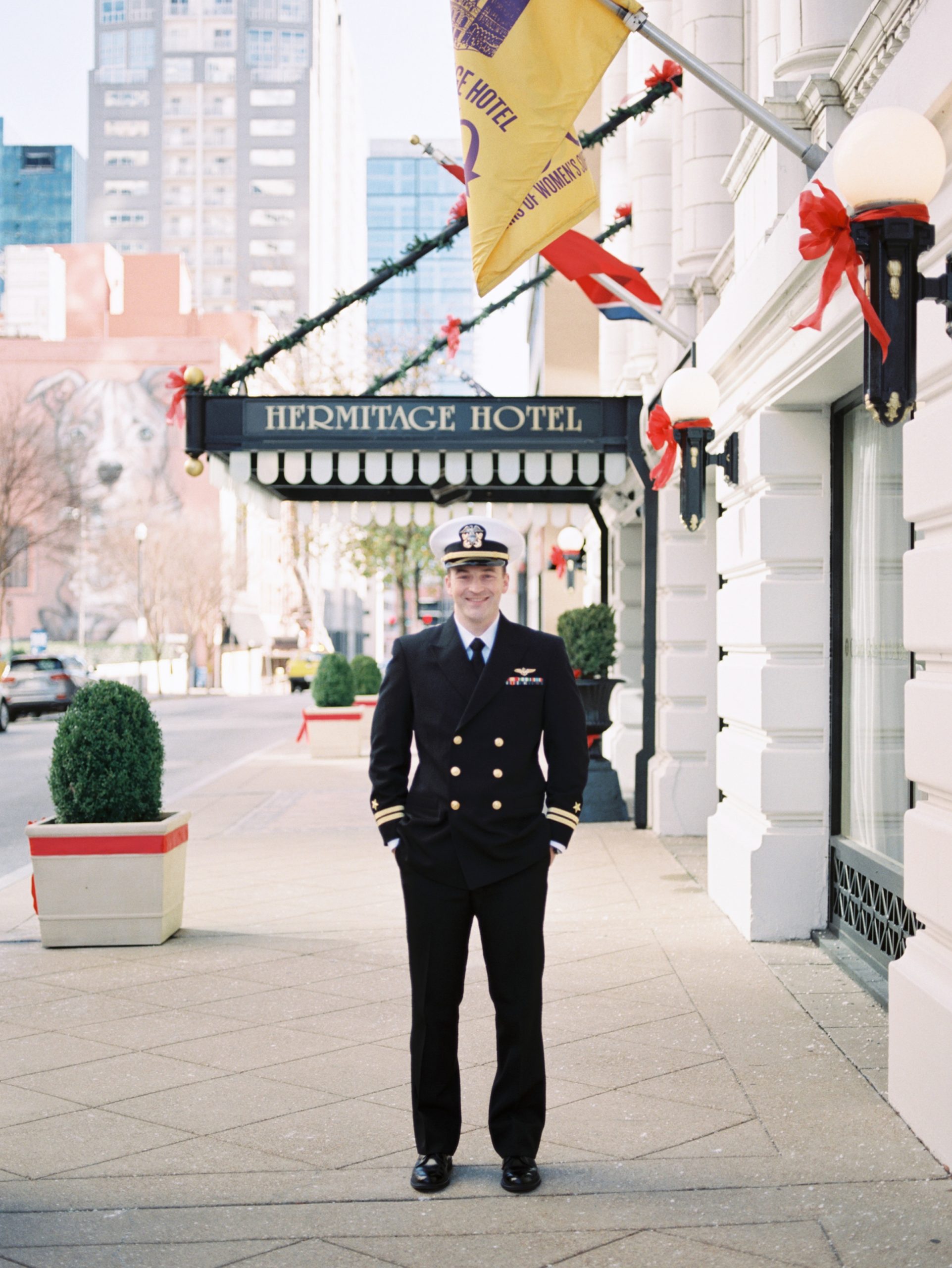 military groom poses outside Nashville hotel