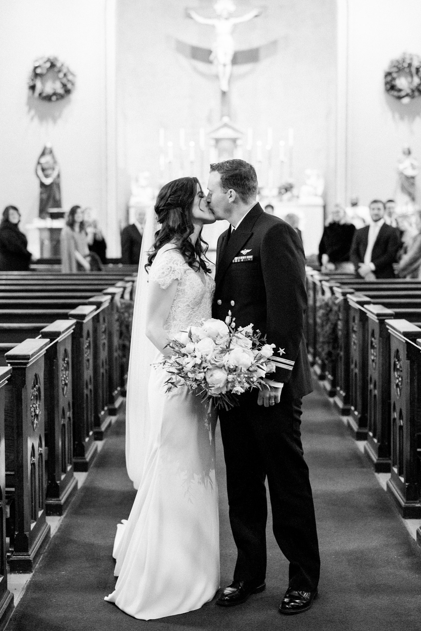 bride and groom kiss after traditional church wedding ceremony in Nashville TN church