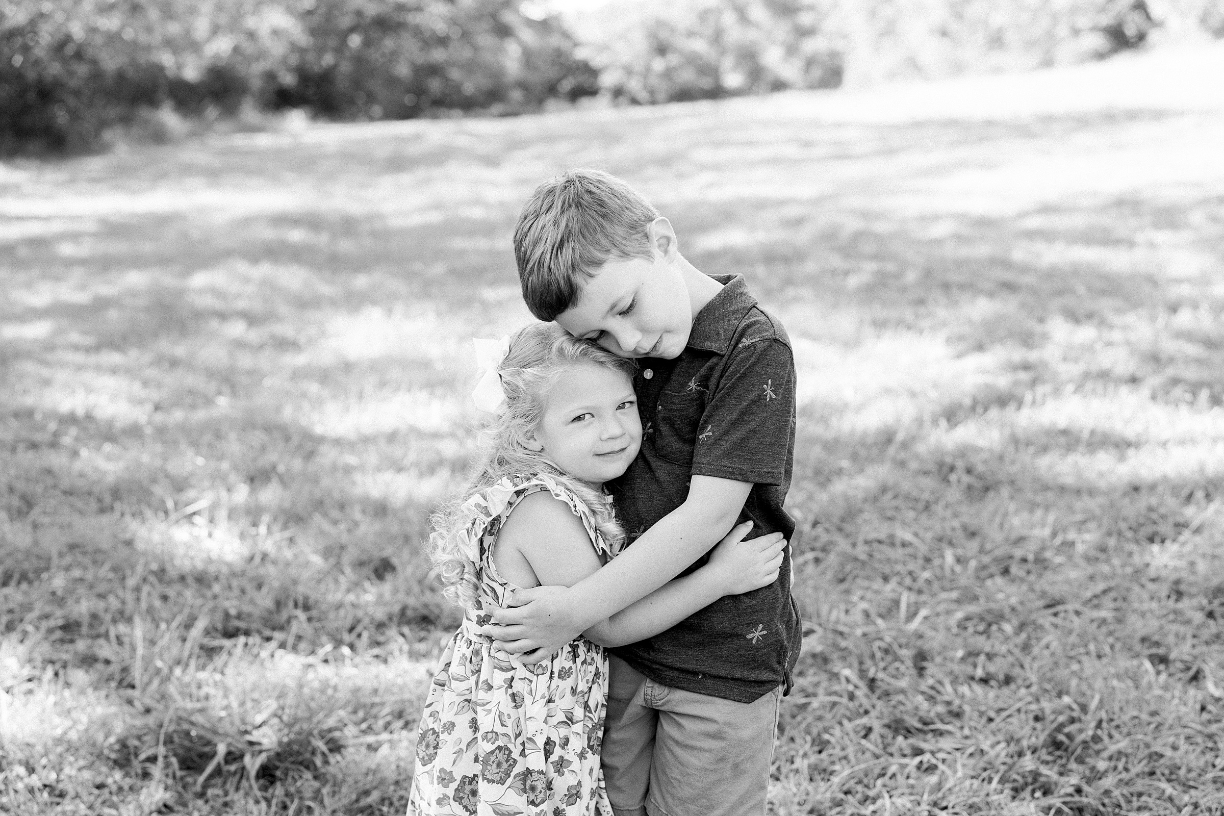 siblings hug each other