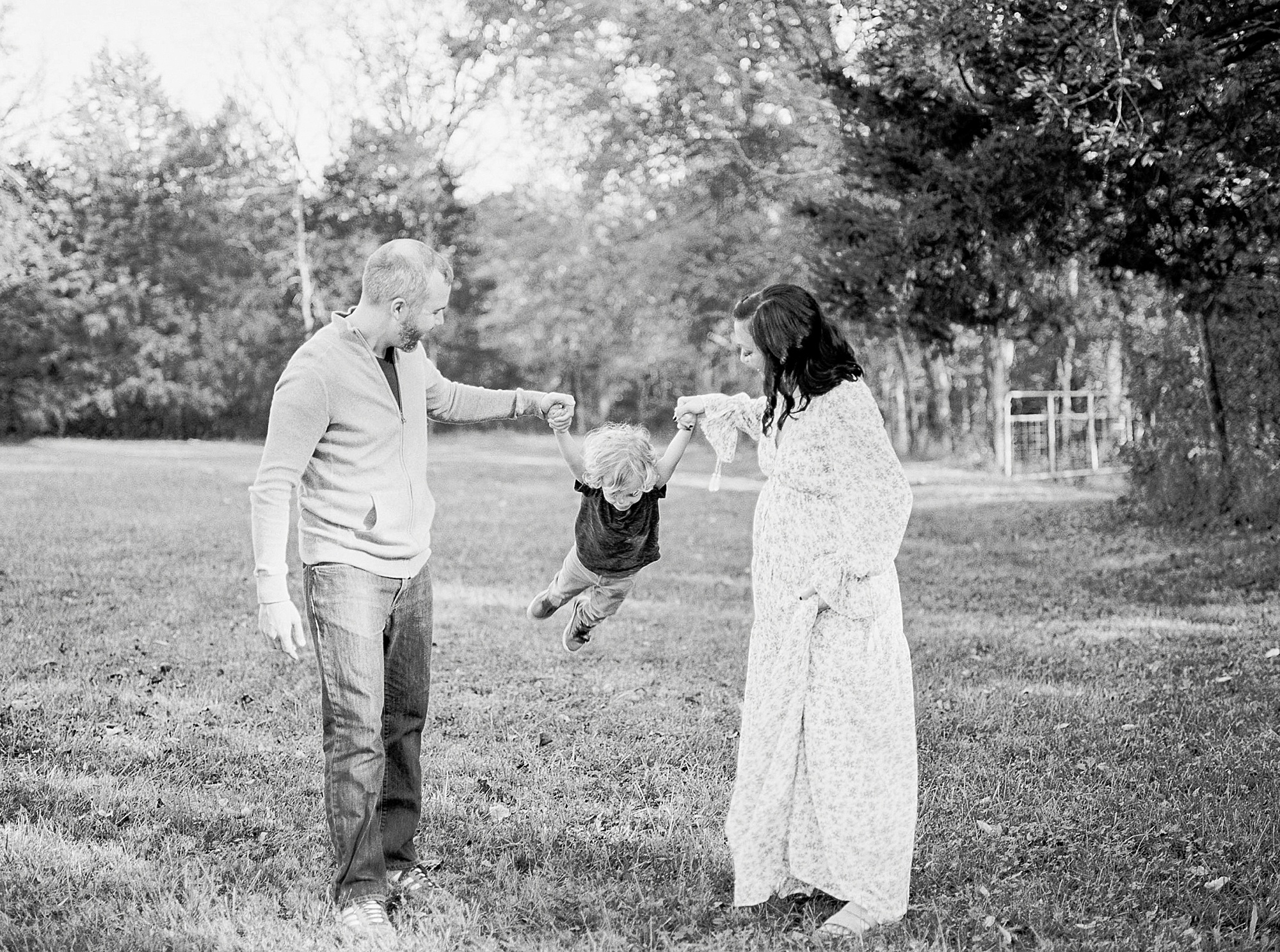 parents swing their son as they walk during Nashville Family Session