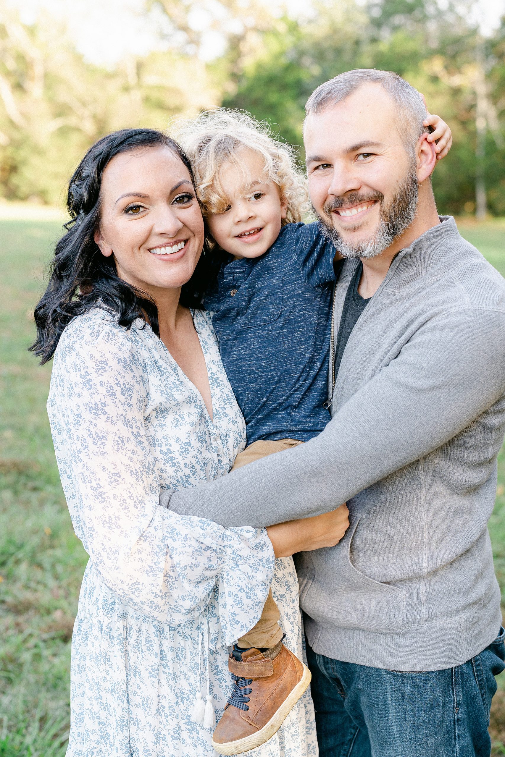 mom and dad hug their son during Nashville Family Session
