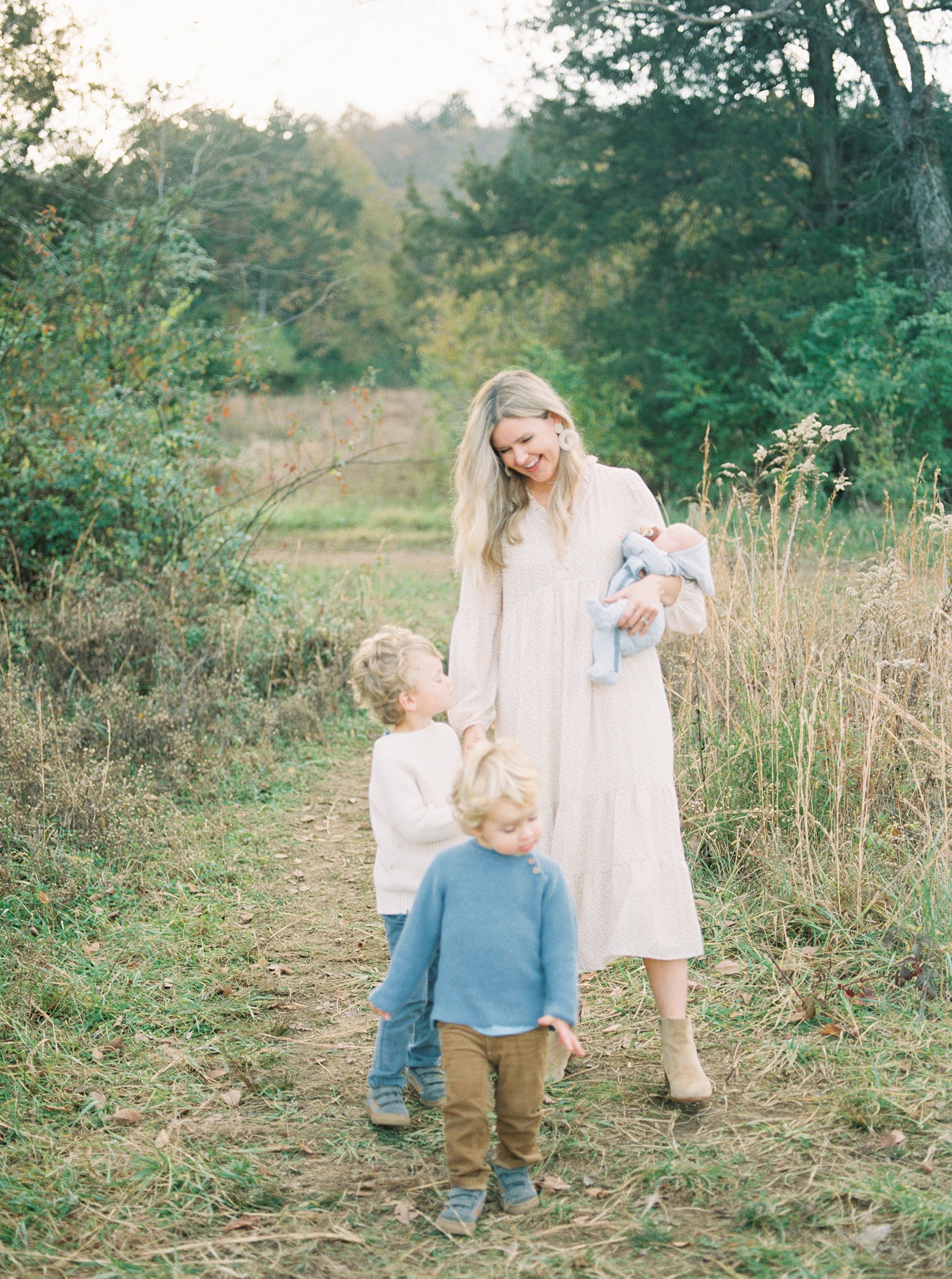 mom with her 3 boys during Brentwood Outdoor Newborn + Family Session